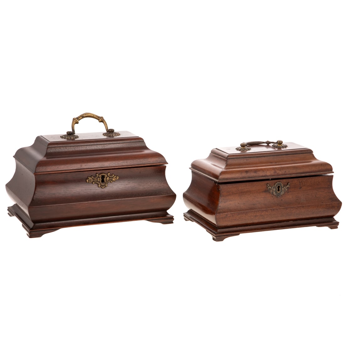 Two Regency Revival Bombe-Form Mahogany Tea Caddies: Includes an English Mahogany bombe-form tea caddy with brass hardware, purple velvet lining at top, includes three interior canisters and key, 5 3/4 in. H, approx. 9 in. L, 5 1/2 in. D; and an Anglo