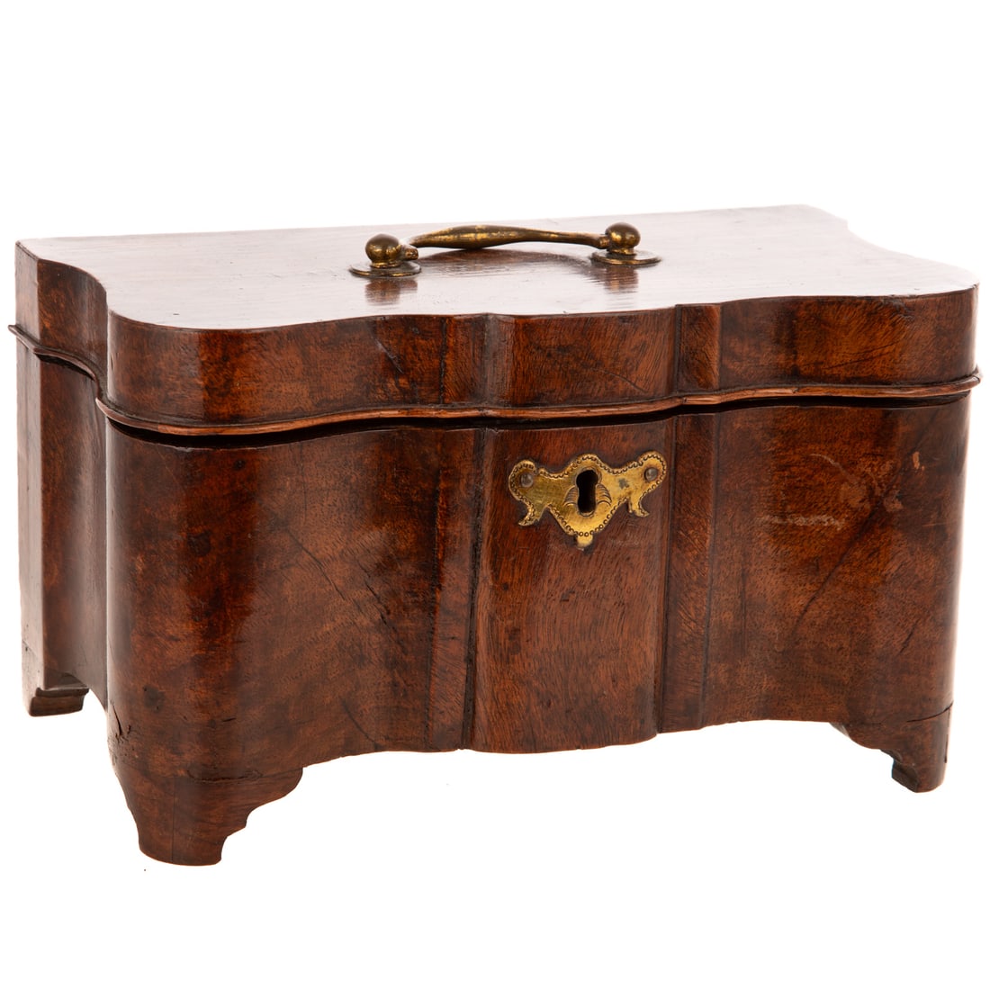 A Late Georgian Walnut Tea Caddy: Mid-19th century, a walnut burl Georgian tea caddy with serpentine front, brass hardware, includes key and three interior canisters, 5 3/4 in. H, 9 1/2 in. L, approx. 5 1/4 in. D Provenance: From the