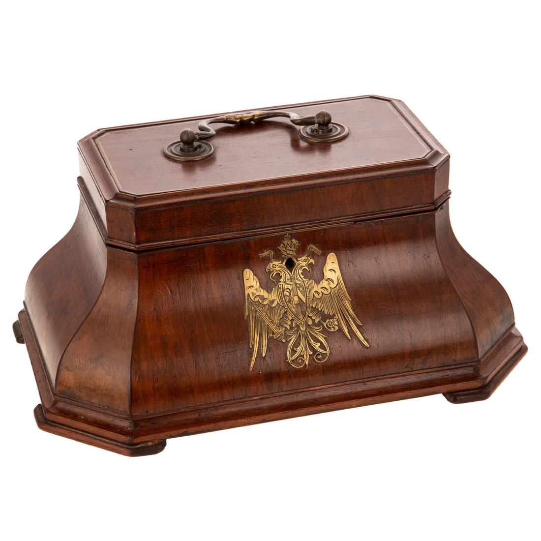 A Hungarian Walnut Tea Caddy: Early 20th century, a Hungarian figured walnut tea caddy with brass hardware, double headed eagle escutcheon, duel interior sections with carved wood lids and gilt accents, 5 3/4 in. H, 11 1/2 in. L,