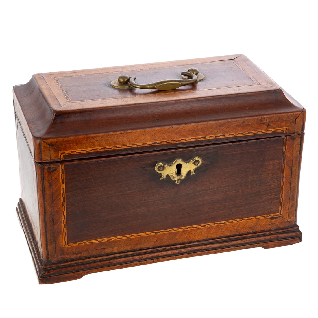 A Georgian Mahogany Tea Caddy: Early 19th century, a English mahogany tea caddy with brass accents, Regency scroll lock escutcheon and bail top handle, boxwood/satin wood stringing parquetry. Three interior sections, two sections w