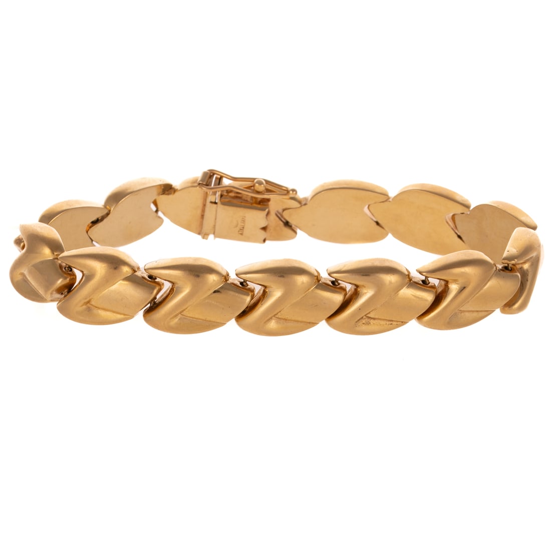 A Vintage Italian Gold Bracelet in 14K: Vintage 14K yellow gold Italian bracelet designed as a high polish tube with ridged zig-zag motif across each link, hidden box clasp and safety latch, 7 3/8 in. L, 19.5 grams Provenance: From the Esta