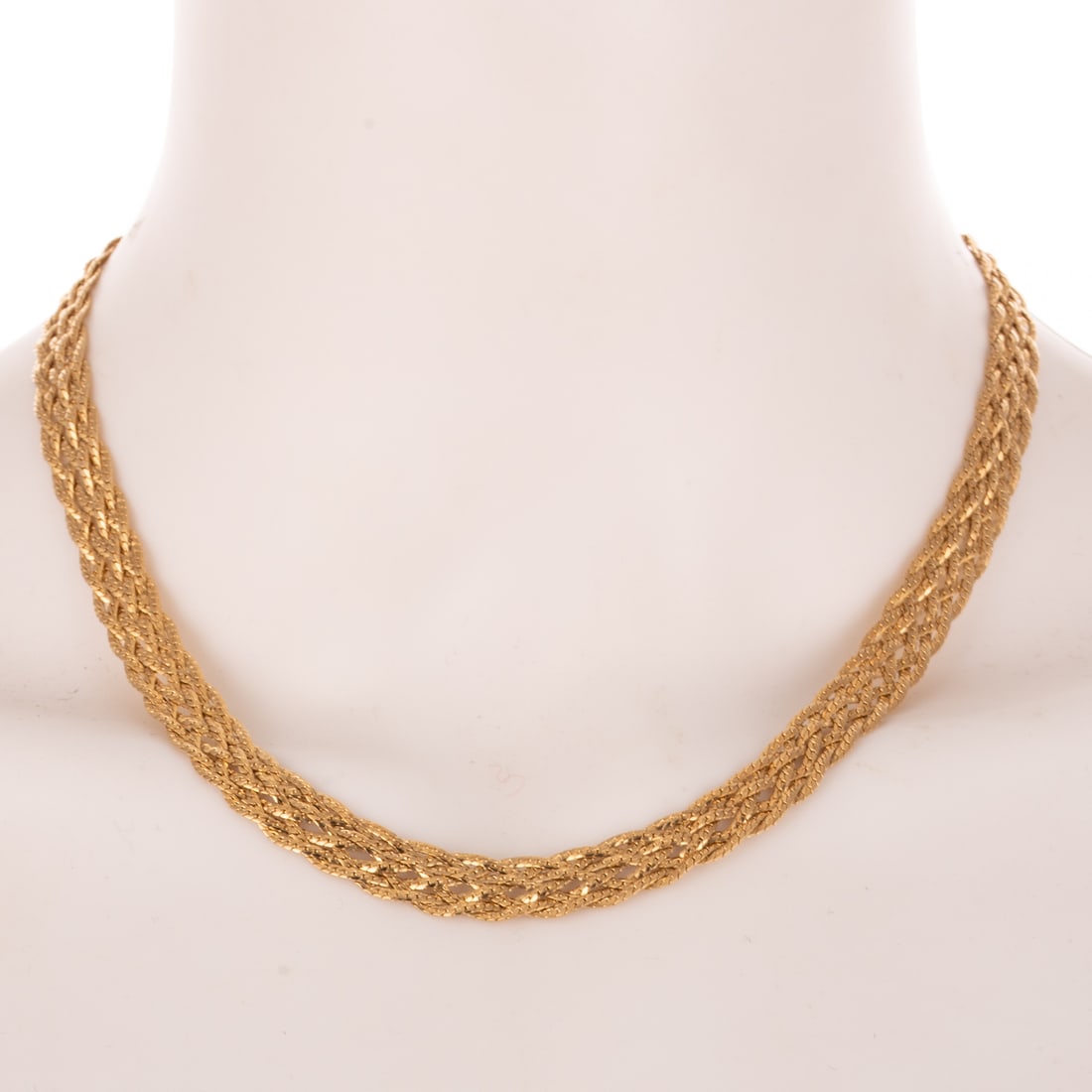 A Braided Gold Necklace in 14K: 14K yellow gold braided chain necklace, with hook clasp, can be worn at various lengths from approx. 17 to 19 1/4 in. L, 27.3 grams Provenance: From the Estate of Louis B. McCarthy, Baltimore, MD