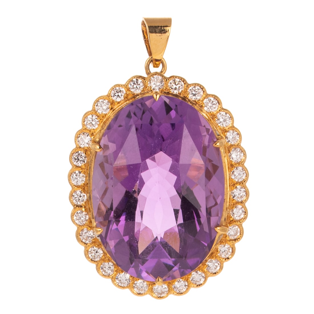A 20.00 ct Amethyst & Diamond Pendant in 18K: 18K yellow gold pendant featuring a large oval shaped amethyst weighing approx. 20.00 ctw prong set in a halo of round diamonds weighing approx. 1.50 ctw with an average color grade of G - H and an