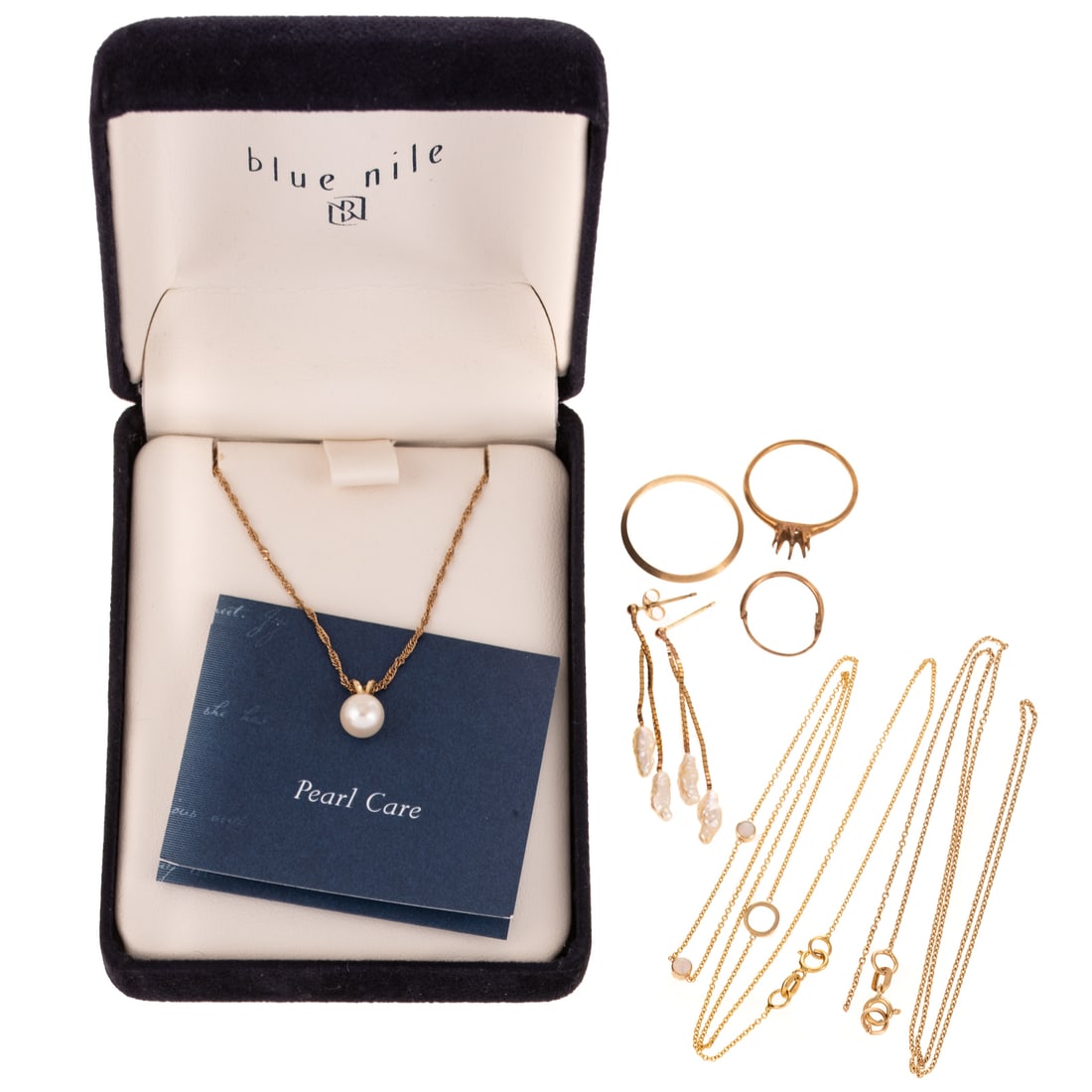 A Pearl Necklace, Earrings, Opal Necklace & More in Gold: 1) 14K yellow gold pendant necklace by Blue Nile featuring a 6.4 mm cultured pearl on split bail suspended from a Singapore chain, 18 in. L, in original box, 2) 14K yellow gold station necklace with