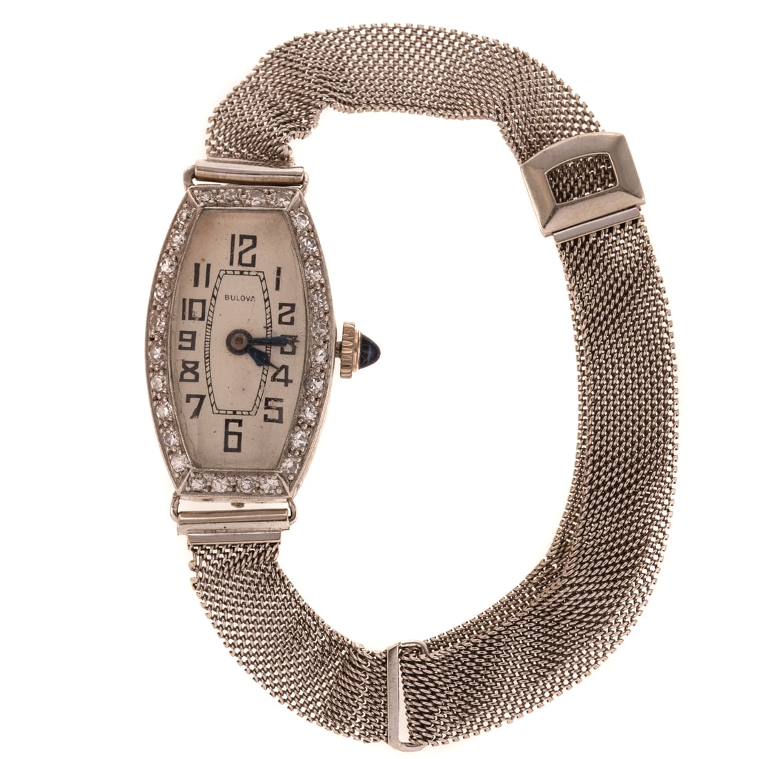 An Art Deco Bulova Diamond Dress Watch in Platinum: Art Deco platinum dress watch by Bulova, the tonneau silver dial with Arabic numerals, blue steel hands and round diamond bead set bezel, 28 mm L, 17 jewel mechanical movement, personalized engraving 