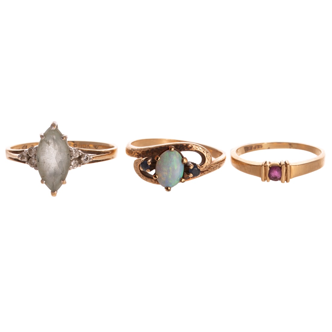 A Trio of Gemstone Rings in Gold: 1) 10K yellow gold ring featuring an oval opal with sapphires on the side, textured knot design, sz 6, 2) 10K yellow gold ring featuring a marquise light blue topaz with trio of diamonds on the side, 