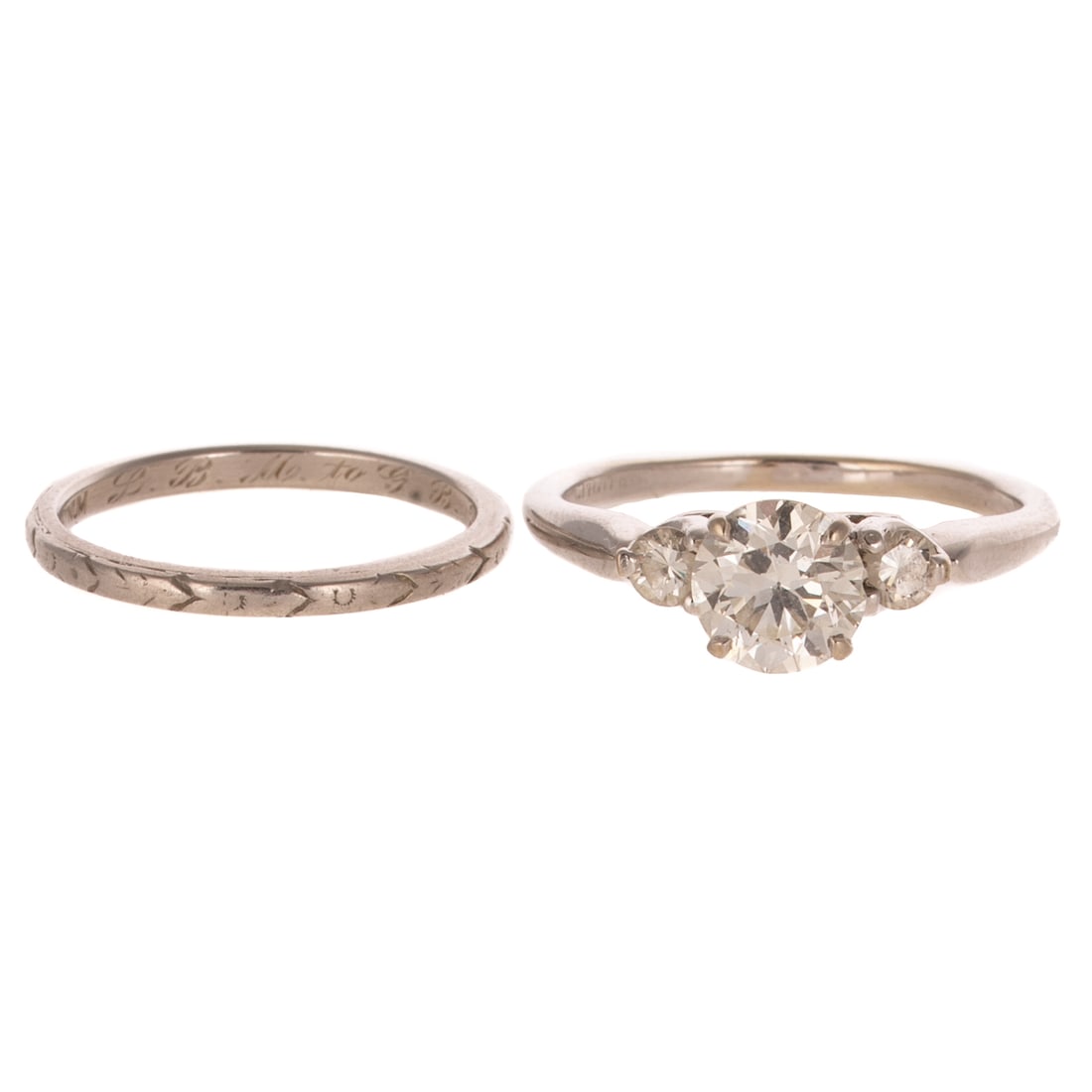 An Art Deco 1.30 ct Diamond Wedding Set in 14K & Platinum: 1) 14K white gold engagement ring featuring an Old European cut diamond weighing approx. 1.30 carats with an average color grade of I - J and an average clarity grade of SI (chip on girdle) prong set,