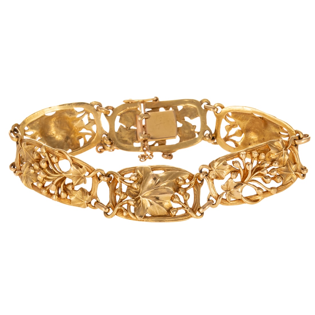An Art Nouveau Floral Panel Bracelet in 18K: c.1900, 19K yellow gold panel bracelet designed alternating floral designs set in branch like rectangular link, box clasp with safety latch, 7 1/2 in. L, 30 grams