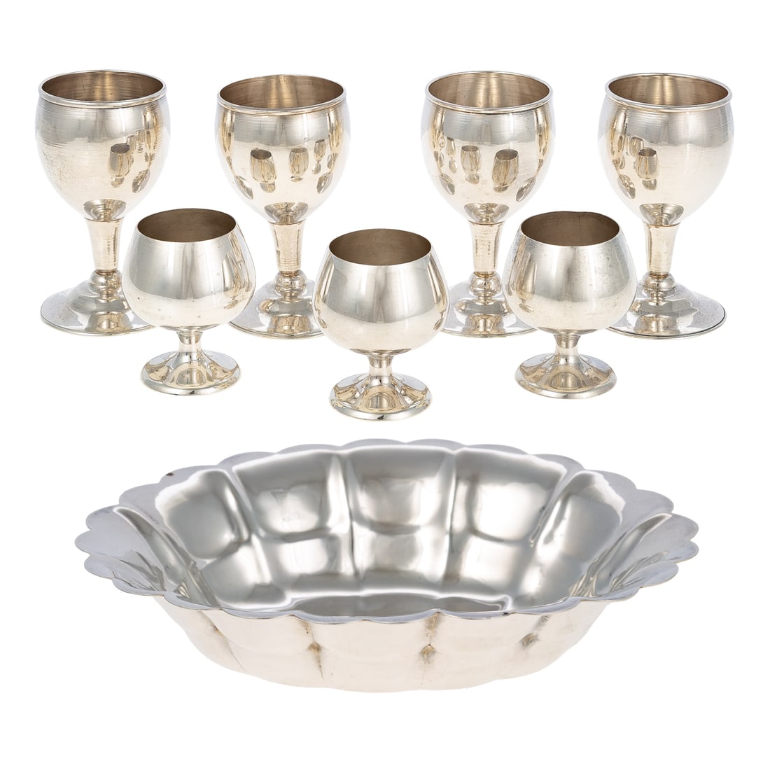 Group of American & Mexican Sterling Tableware: Including: seven Taxco cordials, 3 1/8 in. H; four Gorham cordials, model# 955, 2 in. H; and a pair of Newburyport Silver Co. dishes, 1 1/4 in. H, 6 1/8 in. W, 5 in. D; combined weight is 15.9 ozt.