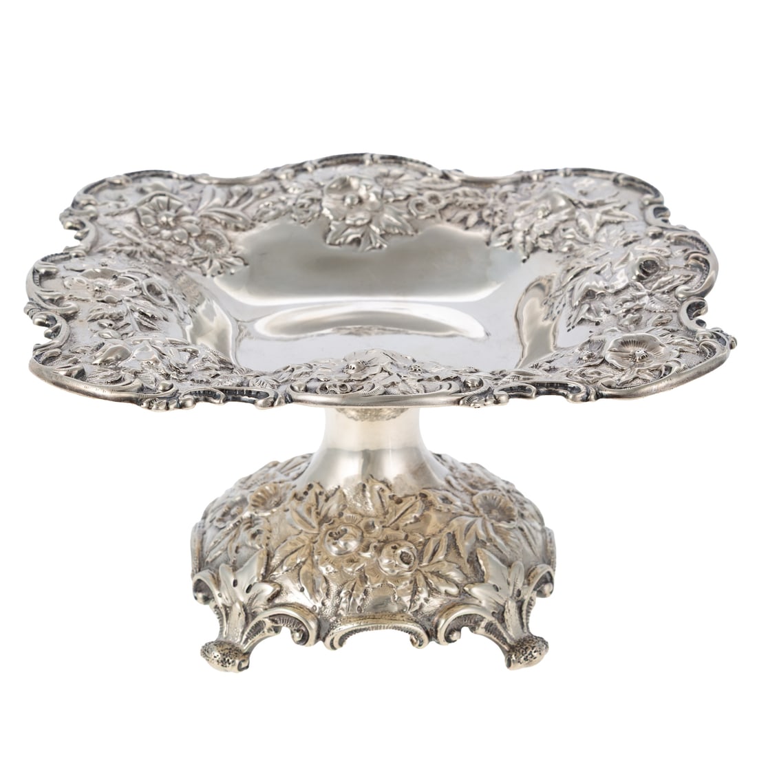S Kirk & Son Sterling Repousse Tazza: 1896-1924, domed foot, supporting a square dish, decorated throughout with repousse flowers and foliage, against a stippled ground, applied scroll rims, 3 5/8 in. H, 6 5/8 in. square, 10 ozt.
