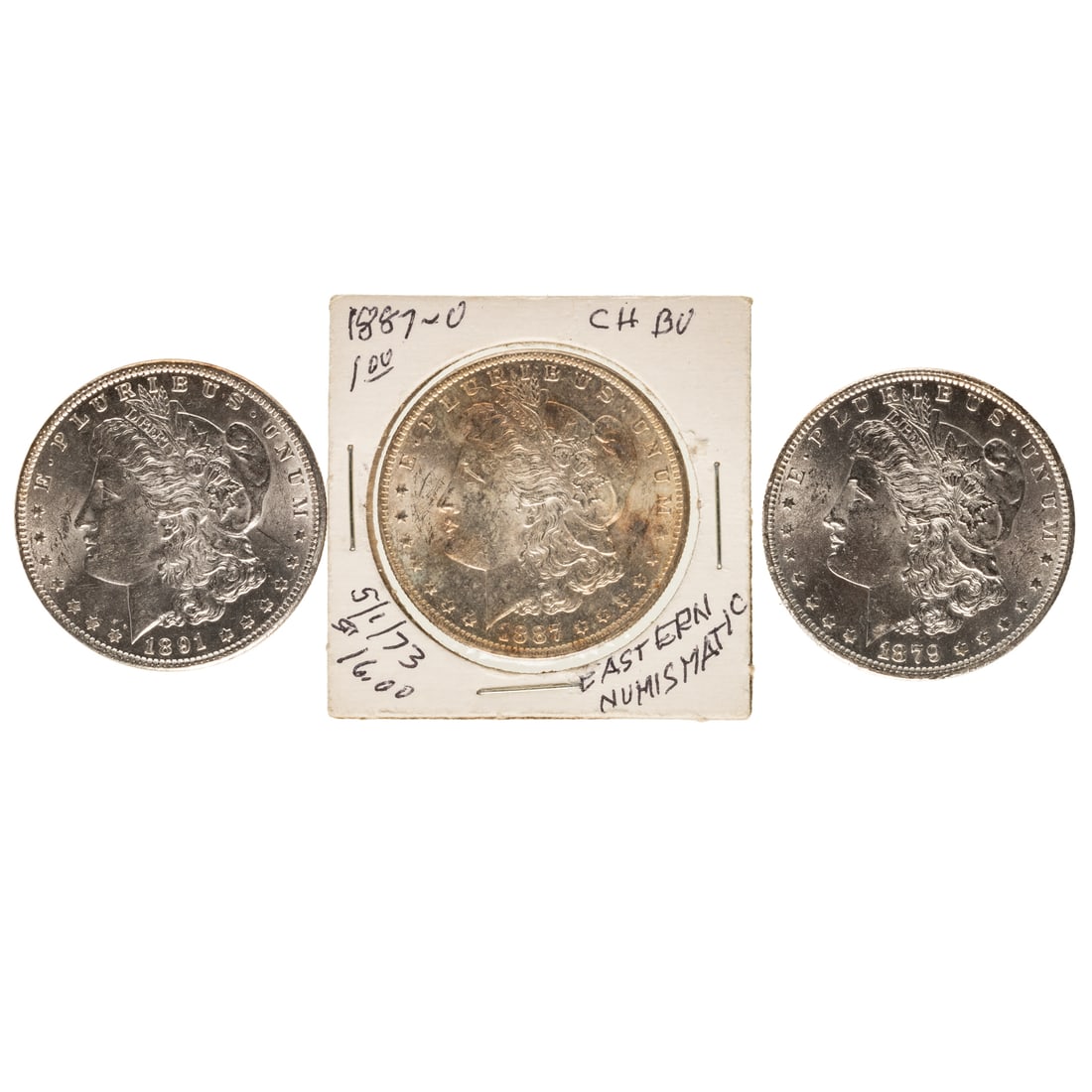 Three Morgan Dollars: 1879-O that was described in 1973 as MS65 by Bowers and Ruddy but is more like a MS62. 1887-O Might have been CH BU in 1973 but is more like a MS60 1891 Morgan MS63 Nice luster from 7/15/73 Bowers and