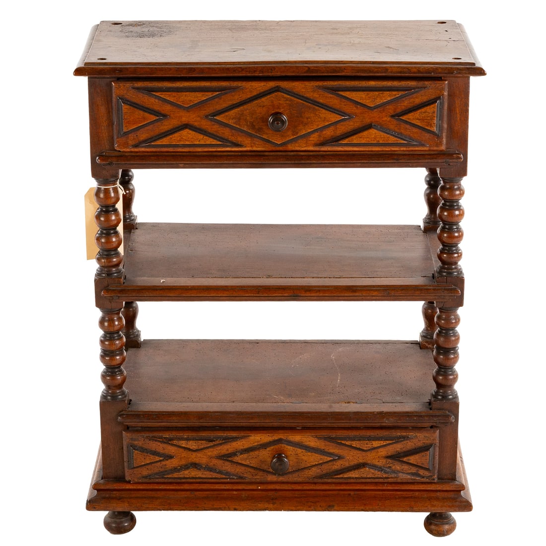 Louis XIII Walnut Two Drawer Side Table: First half, 17th century, molded top over two carved drawers separated by an undershelf, connected by ball turned supports ending in turned bun feet, 31 1/2 in. H, 24 in. W, 12 in. D Provenance: