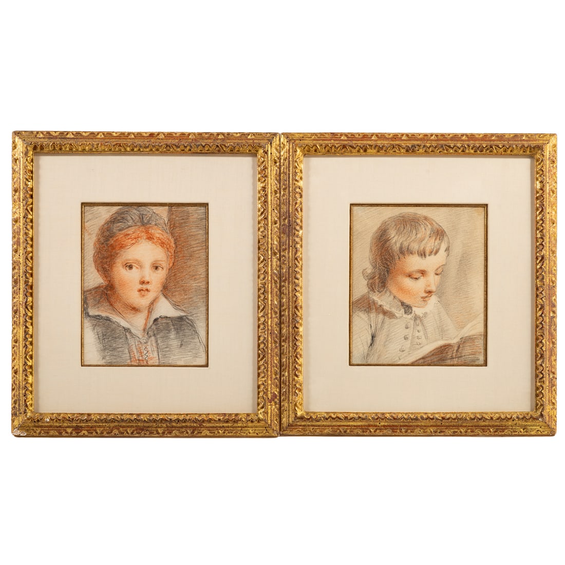 French School. Two Conte Crayon Drawings: (18th century) Depicting a Boy Reading and a Portrait of a Girl, sight size of each: 8 x 6 3/4 in., framed sizes: 15 1/4 x 14 in. Provenance: From a private Maryland collection