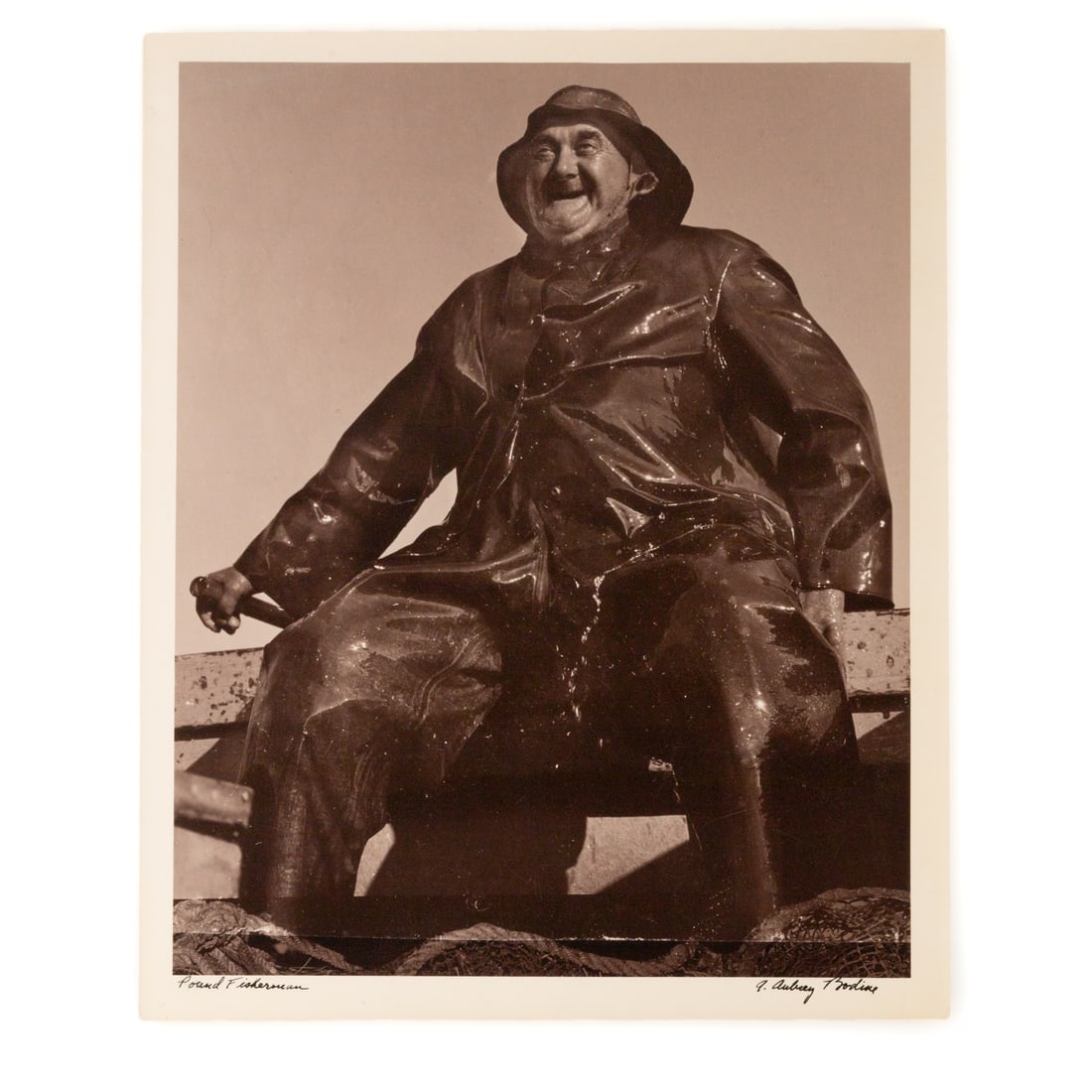 A. Aubrey Bodine. "Pound Fisherman," photograph: (American, 1906-1970) Gelatin silver print, signed "A. Aubrey Bodine" and titled on front, photographer stamps on verso, 14 x 11 in., unframed Provenance: From a private Maryland collection