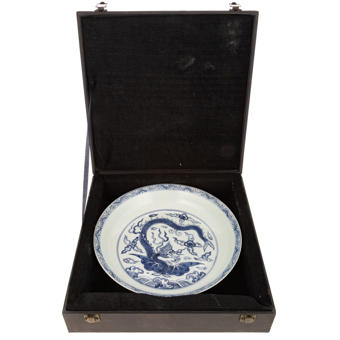 A Chinese Blue & White "Winged Dragon" Dish: A blue and white Chinese porcelain bowl depicting a winged dragon among the clouds and above the waves, with blue Wanli six-character inside double ring on bottom, includes box, approx. 2 1/4 in. H, 1