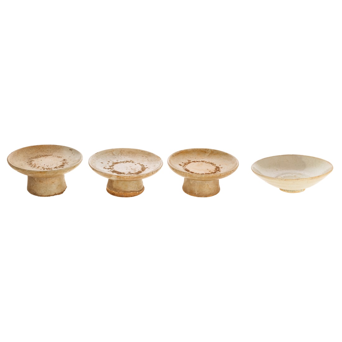 Four Pieces of Korean Joseon Style Pottery: Includes three Korean glazed pottery pedestal dishes, likely for offerings, 2 1/2 to 2 3/4 in. H, 5 3/4 to 6 in. Diam.; and a Korean glazed footed bowl, 2 in. H, 7 in. Diam.