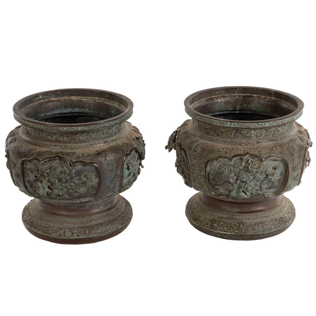 A Pair of Japanese Meiji Bronze Jardinieres: (Japanese, late 19th century) A pair of bronze Meiji jardinieres decoration with florals and birds in high relief and incised details, and the interior removable base panels one with incised crane and