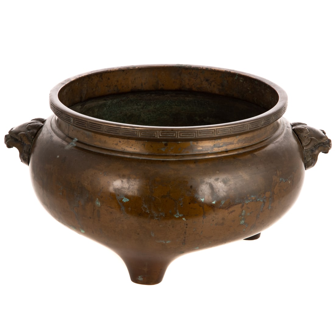 A Chinese Bronze Foo Dog Censer: A Chinese bronze censer with foo dog mask handles, with raised dragon relief on underside, 7 1/2 in. H, 14 1/2 in. W, 12 1/2 in. D