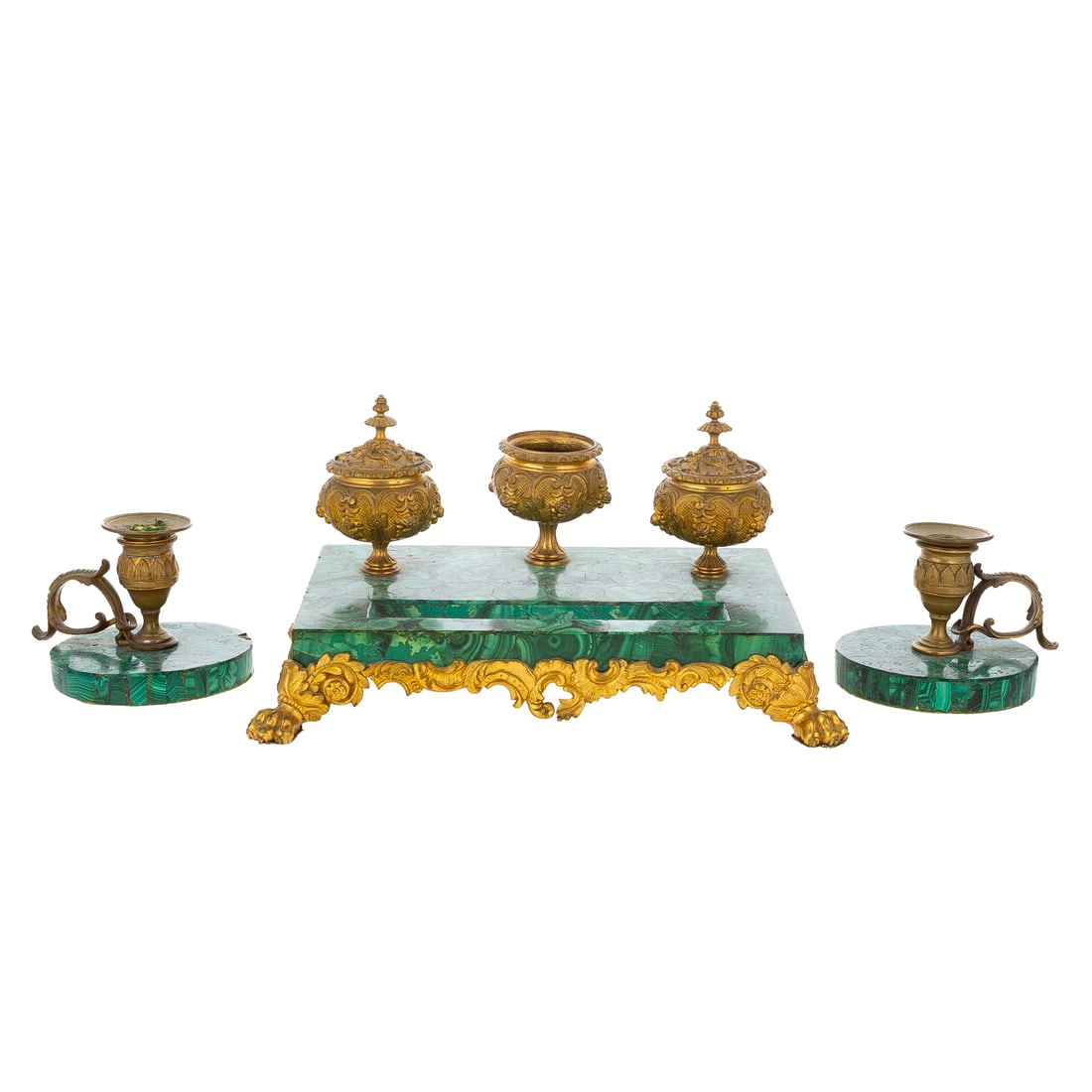 A French Bronze & Malachite Inkwell Set: (19th/early 20th century) A French gilt bronze and malachite rectangular inkwell on paw feet and ornate details and a pair of gilt bronze and malachite candlesticks. Candlesticks: 3 1/4 in. H, 4 3/4