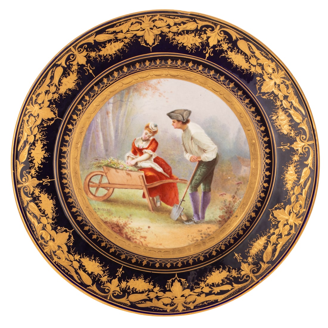 A Sevres Style Porcelain Cabinet Plate: 19th century, a hand-painted Sevres style porcelain cabinet plate depicting a central courting scene and gilt accents on cobalt ground, signed "A. Nicolas," and marked on bottom, approx. 1 in. H, 9