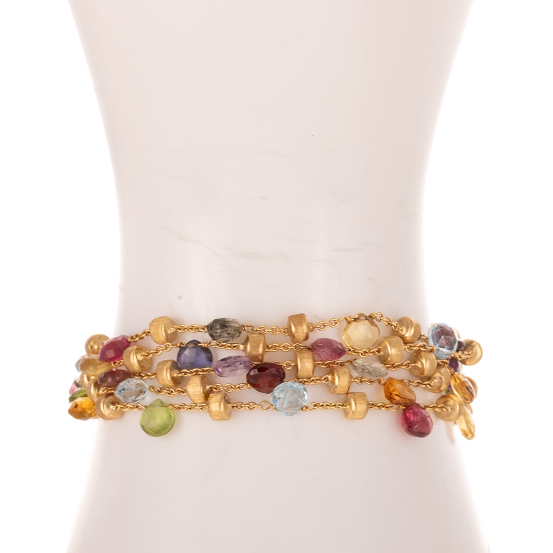 A Marco Bicego Multi Color Gemstone Bracelet in 18K: 18K yellow gold five-strand bracelet by Marco Bicego, part of the Paradise Collection, featuring multi colored gemstone briolettes, stones include garnet, blue topaz, citrine, tourmaline, peridot and