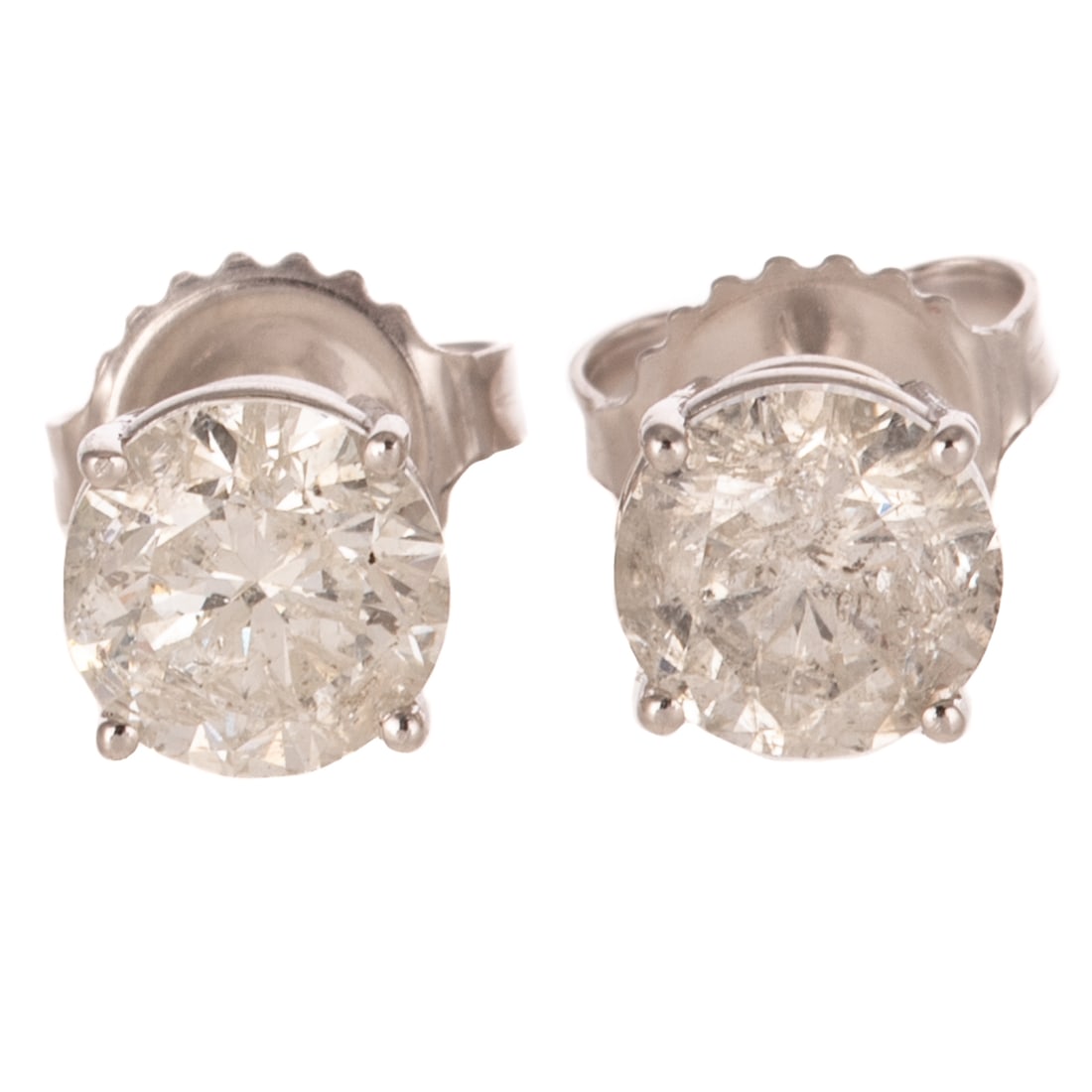 A Pair of 2.00 ctw Diamond Studs in 14K: 14K white gold solitaire stud earrings featuring round diamonds weighing approx. 2.00 ctw with an average color grade of G - H and an average clarity grade of I prong set in a basket setting, posts wi