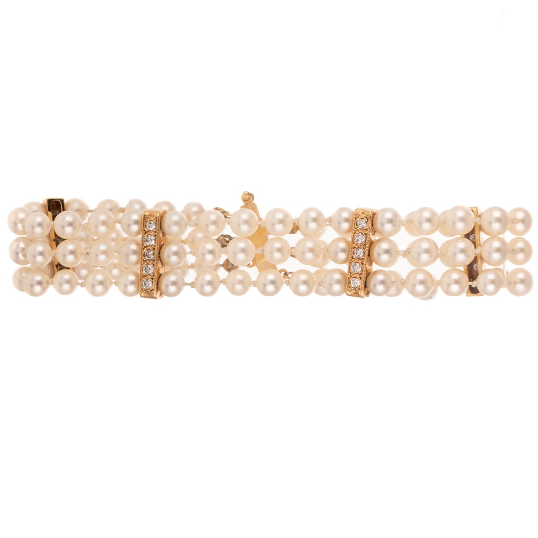 A Triple Strand Pearl & Diamond Bracelet in 14K: 14K yellow gold triple strand cultured pearl bracelet with four diamond bar spacers, approx. 0.50 ctw, pearls measure 5.6 - 6 mm, diamond bar slide clasp, 8 in. L, 25.9 grams Provenance: From the Esta
