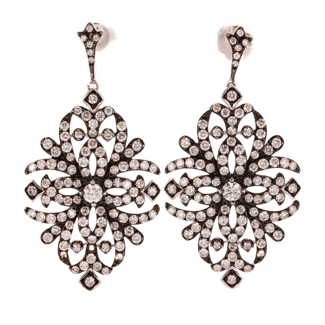 A Pair of Effy Diamond Drop Earrings in 14K: 14K white and oxidized gold drop earrings of vintage style by Effy featuring round diamonds weighing approx. 1.20 ctw prong and bead set, posts and friction backs, signed, 1 5/8 in. L,7.7 grams