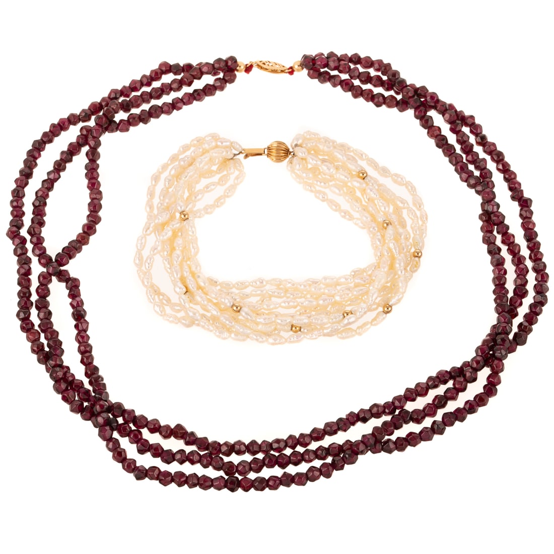 A Multi-Strand FWP Bracelet & Garnet Necklace in 14K: 1) 14K yellow gold ridged ball clasp featuring 10 strands of FWP with gold beads, 8 in. L, and 2) 14K yellow gold filigree clasp featuring triple strand of faceted garnet beads measuring 4.3 mm, 19