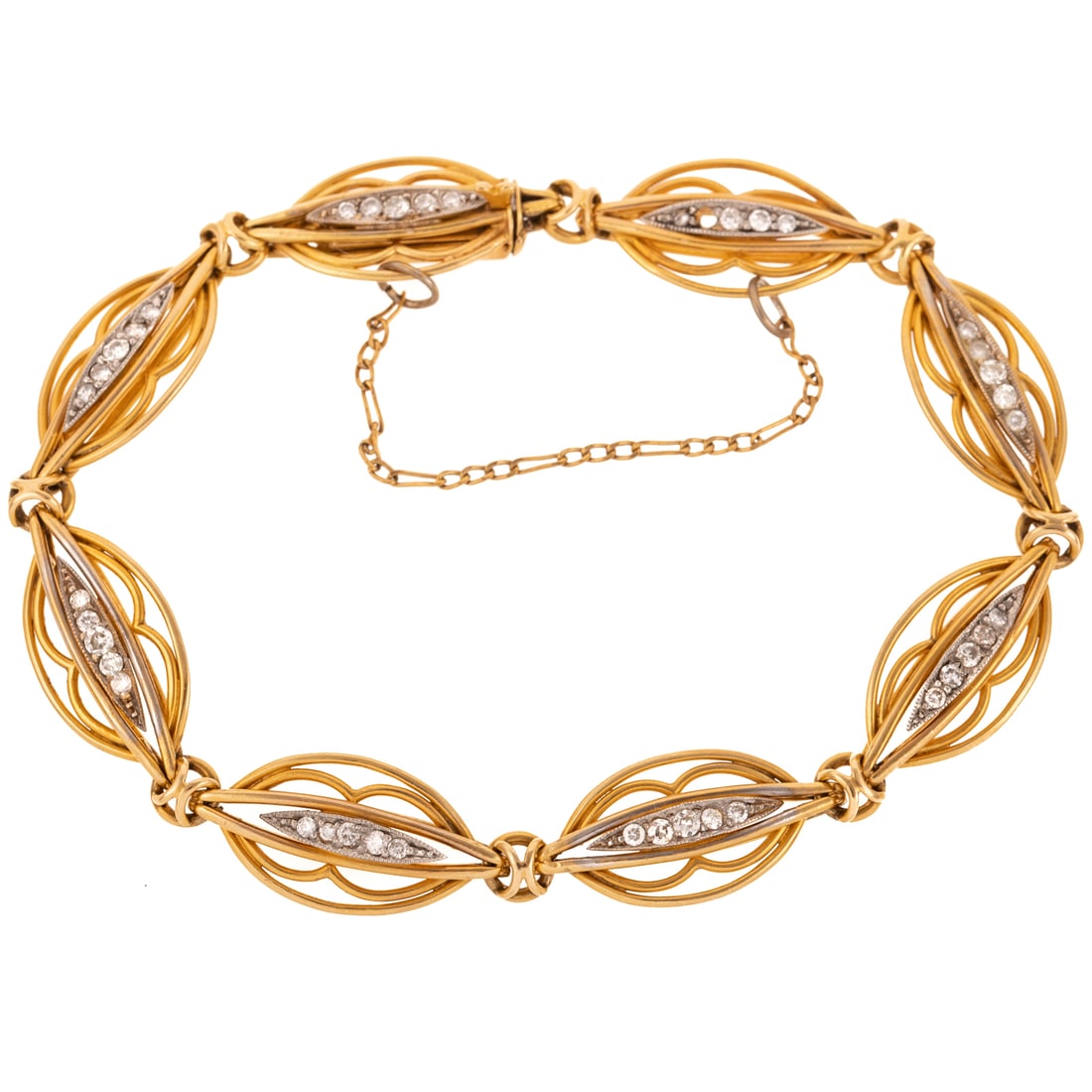 An Art Nouveau Diamond Link Bracelet in 18K: c.1890s, 18K yellow gold link bracelet designed with navette shape links and bead set diamonds weighing approx. 0.35 ctw, hidden box clasp with safety chain, 7 in. L, 15.5 grams Provenance: From the e