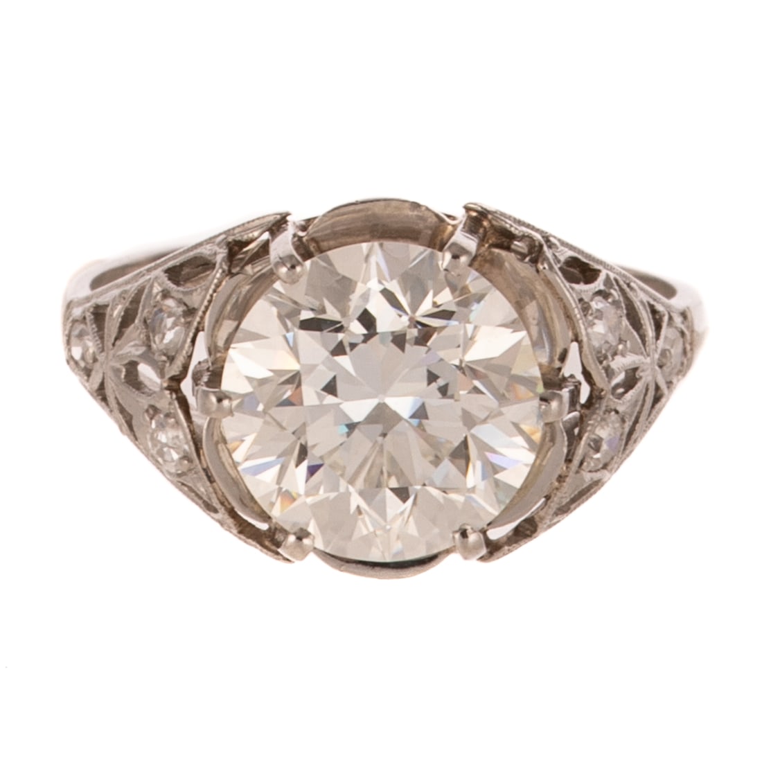 A GIA 3.00 ct Art Deco Diamond Ring in Platinum: Platinum filigree ring featuring an Old European cut diamond weighing 3.00 carats with a color grade of I and a clarity grade of VVS2, no fluorescence, accompanied by GIA Diamond Grading Report #21750