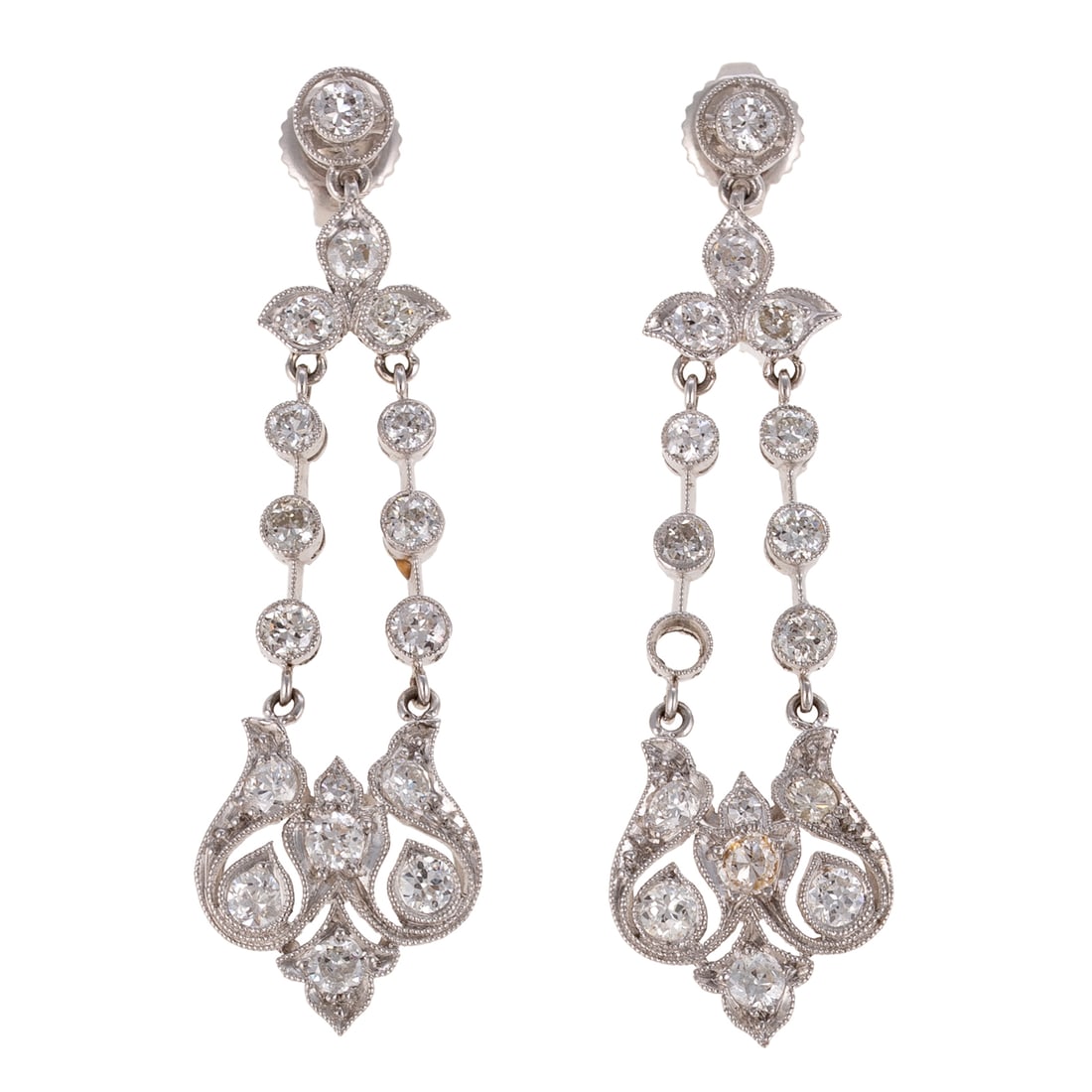 A Pair of Edwardian Diamond Dangle Earrings in Platinum: c.1900s, platinum filigree dangle earrings featuring Old European cut diamonds weighing approx. 1.65 ctw bezel and bead set, milgrain accent, posts with 14K white gold friction backs, 1 3/4 in. L, 6.0