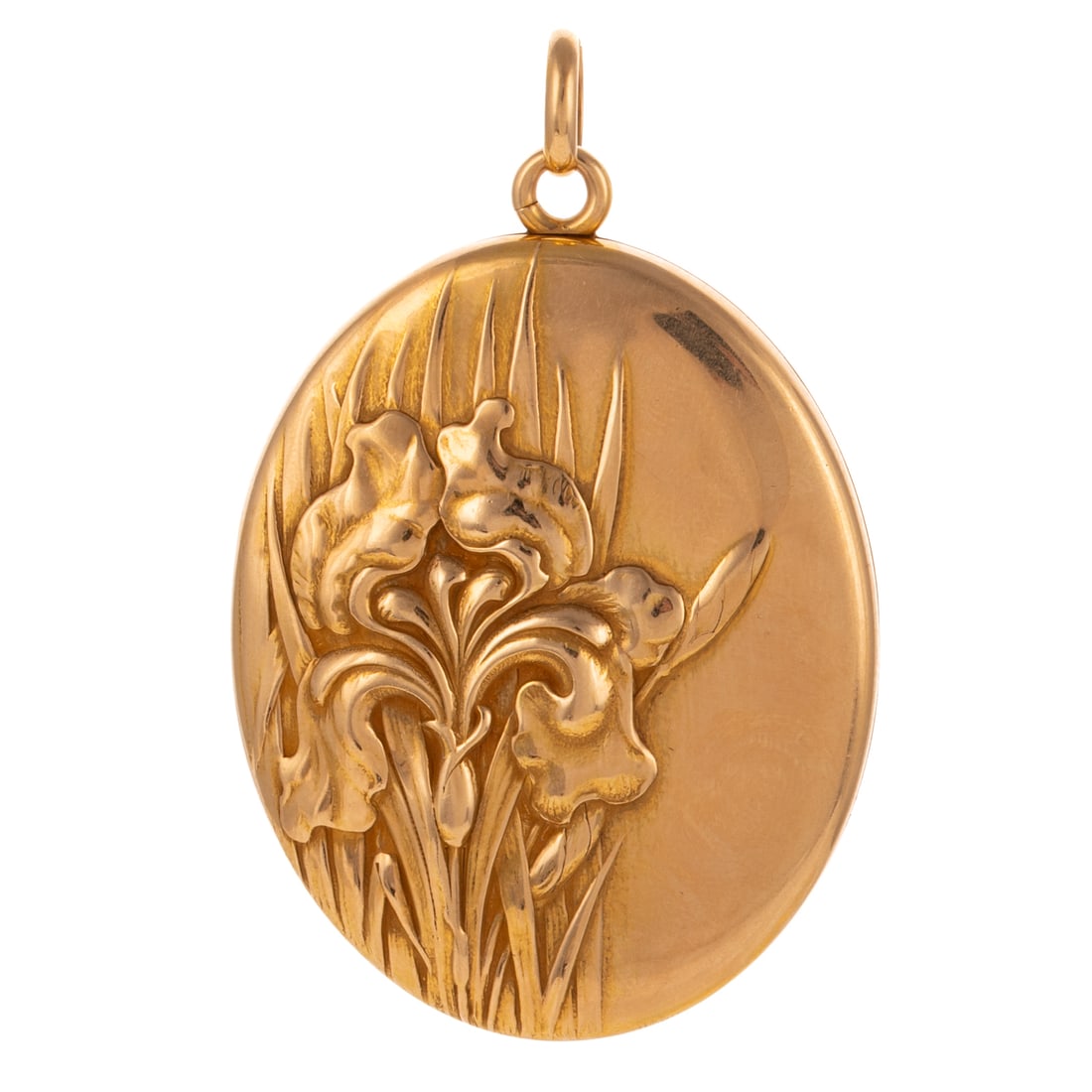 An Art Nouveau Repousse Iris Locket in 14K: c.1890s, 14K yellow gold large oval hinged locket by Carter and Gough, New York, NY designed with a repousse high relief iris flower design to left side of locket, high polish finish on back, 2 in. L,
