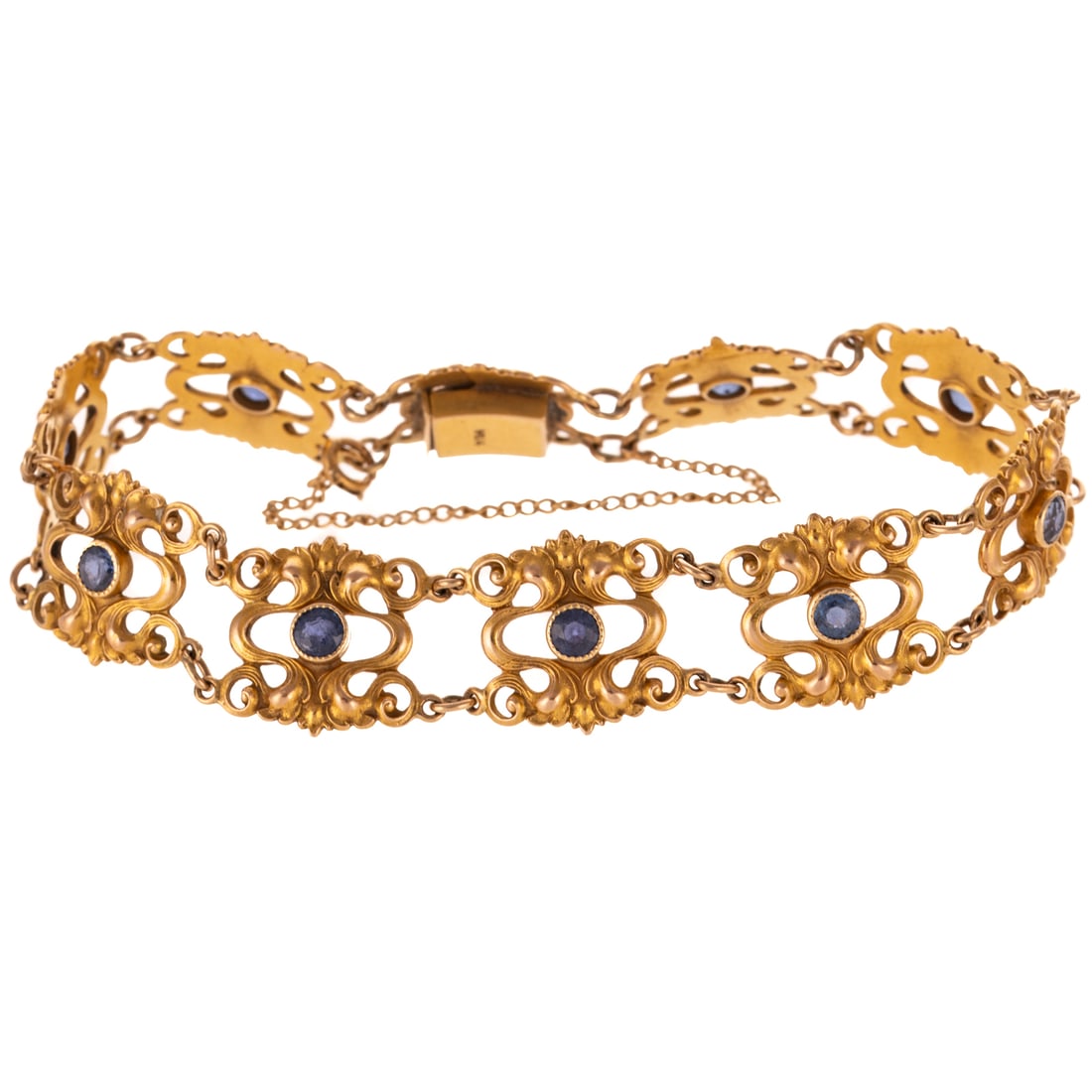 An Allsopp-Bliss Sapphire Link Bracelet in 14K: c.1890s 14K yellow gold Art Nouveau link bracelet by Wordley, Allsopp & Bliss, Newark, NJ, featuring bezel set sapphires weighing approx. 2.50 ctw set in center of double sided scroll link, hidden box