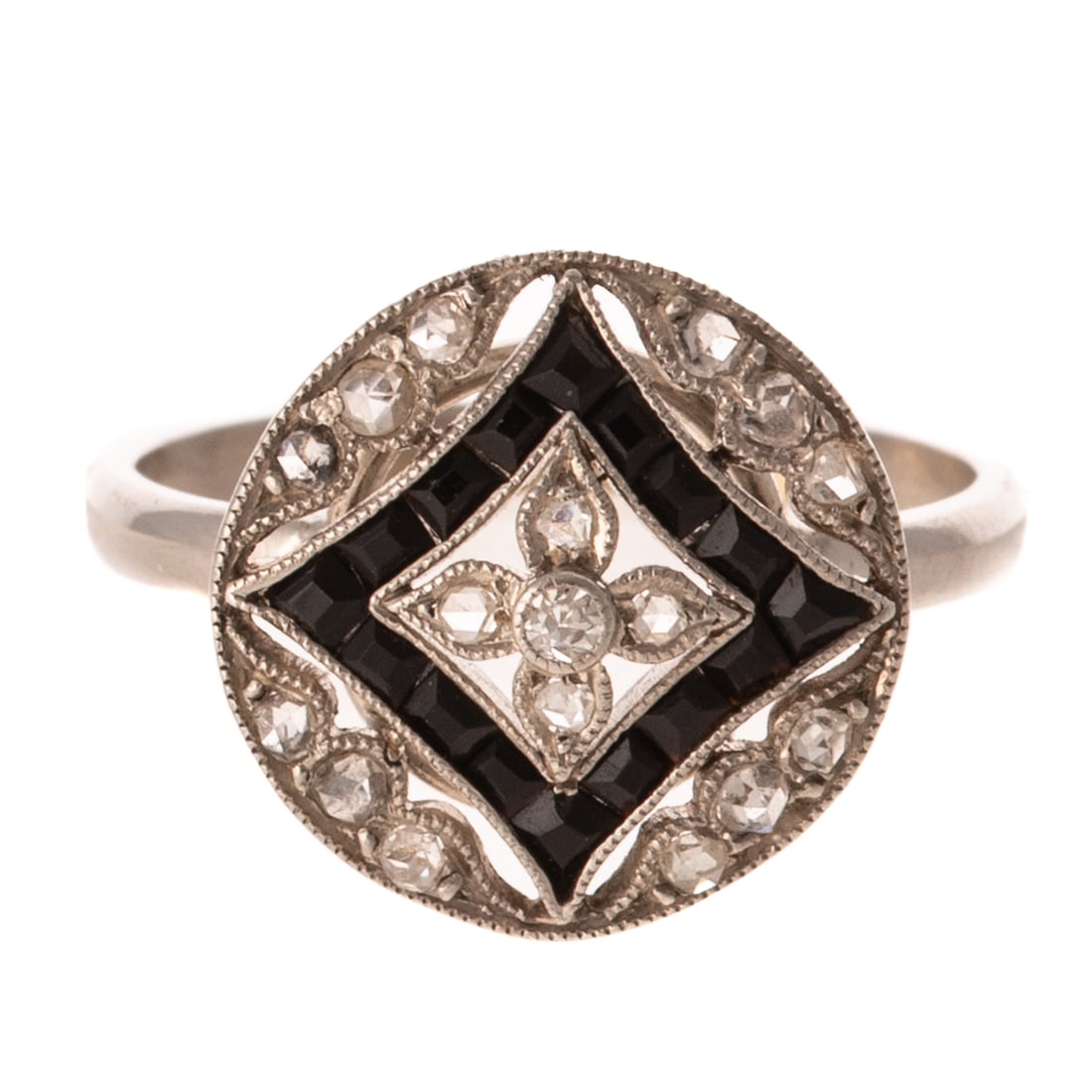 An Art Deco Diamond & Onyx Filigree Ring in Platinum: Platinum ring featuring faceted black onyx channel set with milgrain accent in geometric pattern with rose cut diamond flower in the center and throughout the circular frame, sz 6.25, 3.4 grams Proven