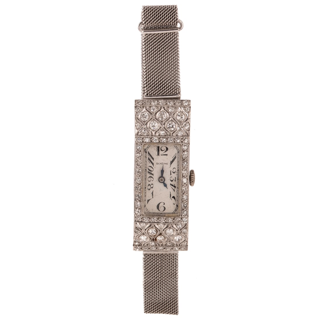 An Art Deco Diamond Glycine Watch in Platinum: c.1920s, platinum wrist watch by Glycine with rectangular dial and Arabic numerals, 1 5/8 by 1/2 in., diamonds set in case weighing approx. 1.40 ctw, adjustable length mesh bracelet with fold over eng
