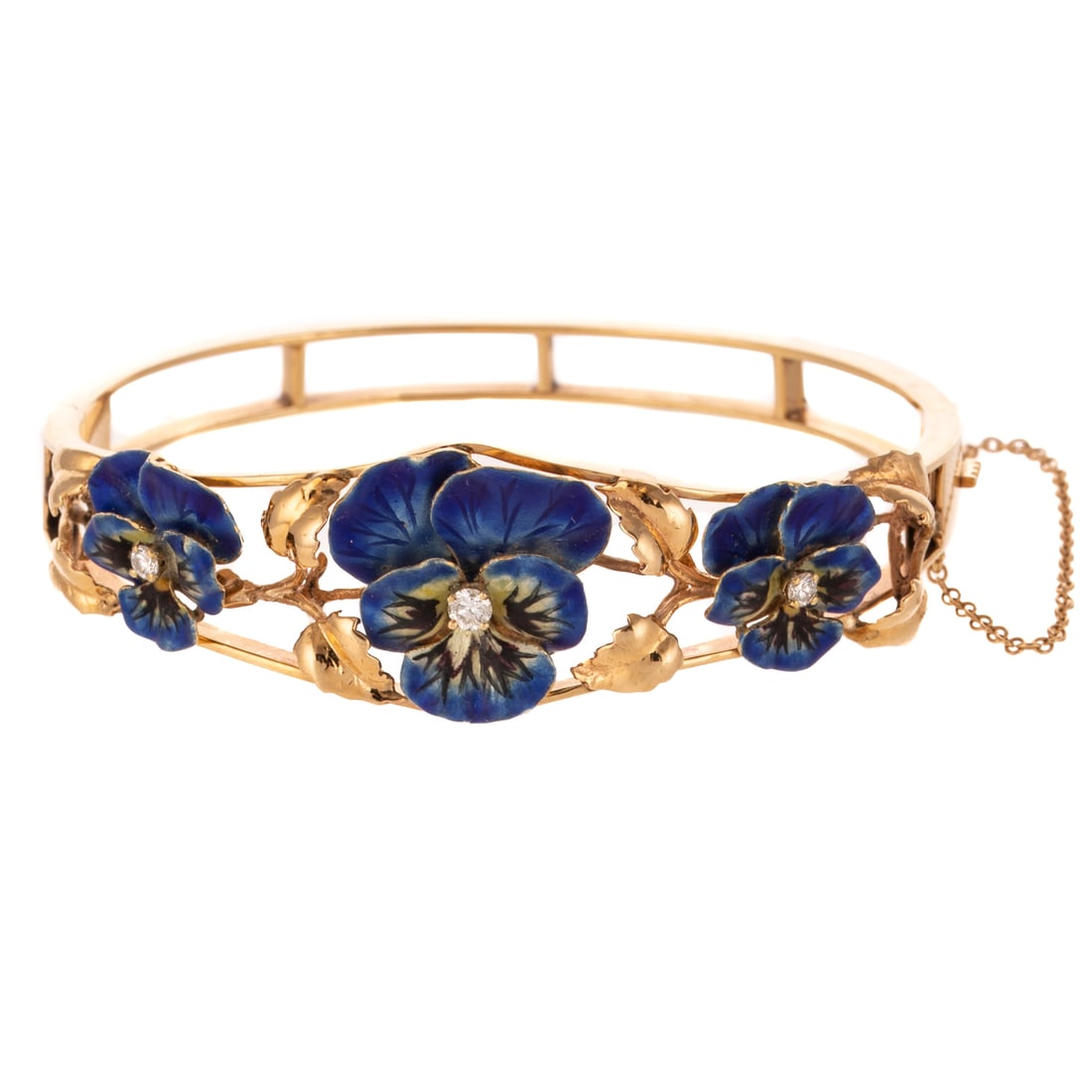 An Enamel Pansy & Diamond Bangle in 14K: 14K yellow gold oval hinged bangle bracelet featuring three blue enamel pansies with diamond in the center and high polish leaf accents in between flowers, box clasp with safety clasp, 3/4 in. W, 2 1/