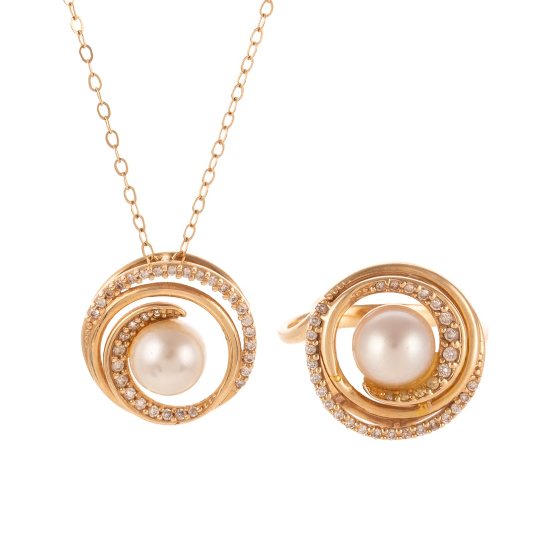 A Pearl & Diamond Ring & Pendant Set in 14K: 14K yellow gold matching pearl and diamond ring and pendant set by Maui Divers Jewelry, ring features a 7.5 mm pearl in center of bead set diamond spiral, sz 7, with matching design pendant hanging on