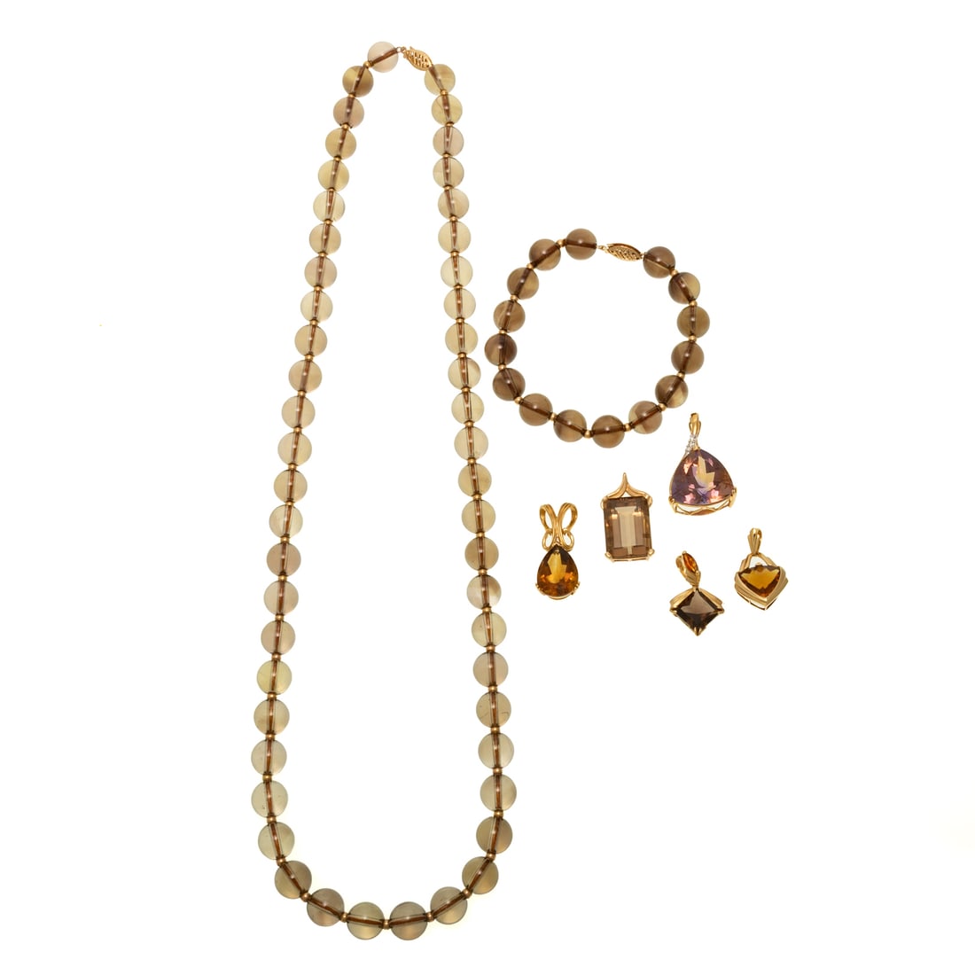 A Smoky Quartz Bead Set & Five Gemstone Pendants in 14K: 1) 14K yellow gold bead necklace featuring 10 mm smoky quartz beads alternating with yellow gold spacers, filigree clasp, 24 in. L, together with a matching bracelet, 7 1/2 in. L, 2) 14K yellow gold p