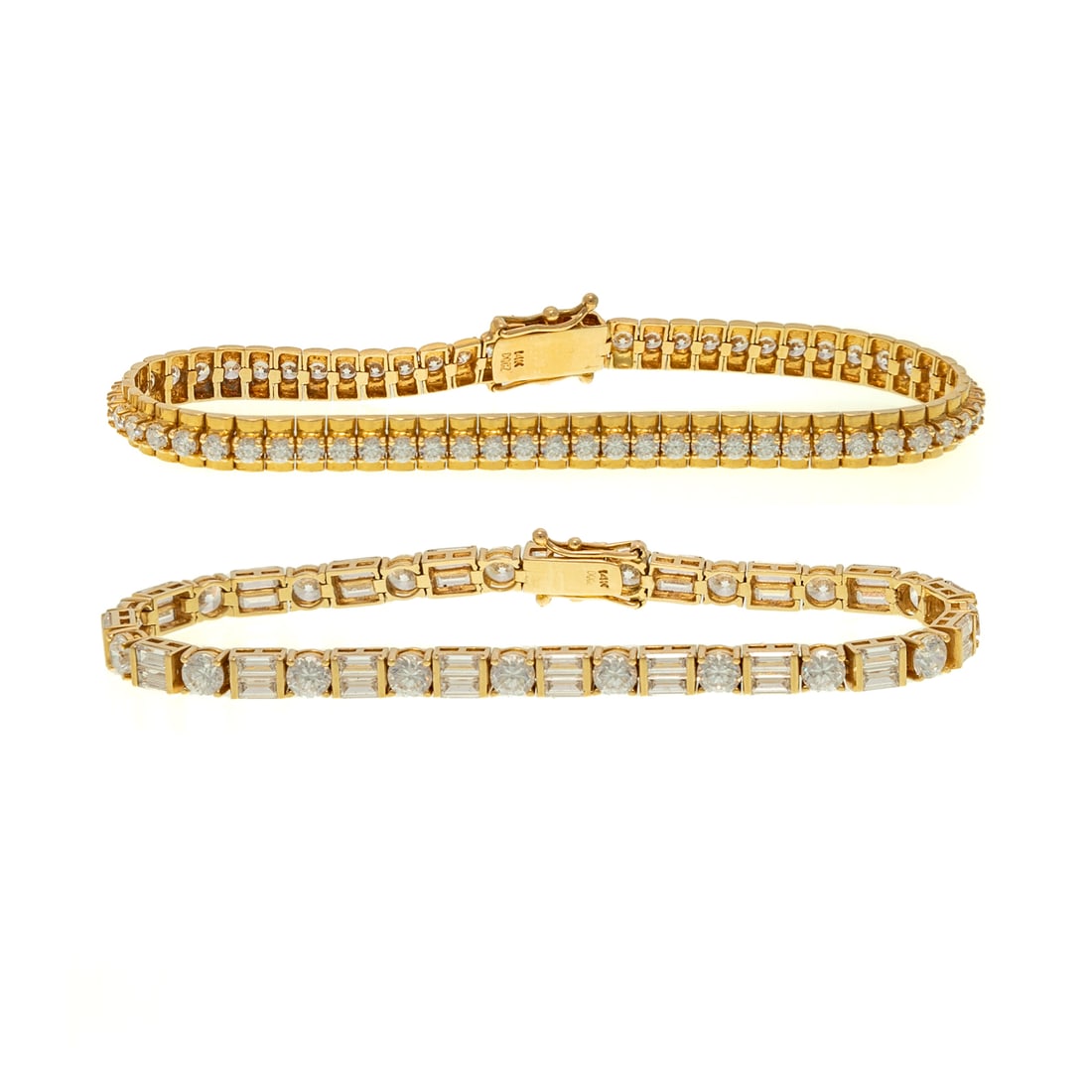 Two CZ Line Bracelets in 14K: 1) 14K yellow gold line bracelet featuring alternating round and baguettes CZ's, box clasp with safety latch, 7 in. L, and 2) 14K yellow gold round CZ line bracelet, box clasp with safety latch, 7 in.