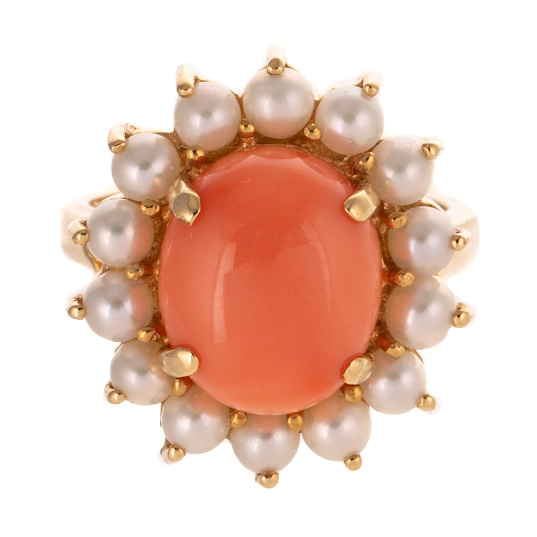 A Vintage Coral and Pearl Ring in 14K: 14K yellow gold ring featuring an oval coral cabochon 12 x 10 mm, prong set with a halo of pearls, each approx. 3 mm, sz 6.25, 6.1 grams Provenance: From the estate of a private collector, Great Falls