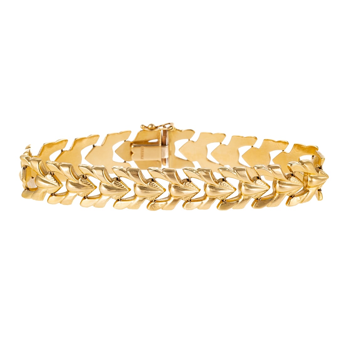 A High Polish Italian Chevron Link Bracelet in 14K: 14K yellow gold Italian bracelet featuring openwork high polish and textured chevron links, hidden box clasp and safety latch, 7 1/4 in. L, 13.3 grams Provenance: From the estate of a private