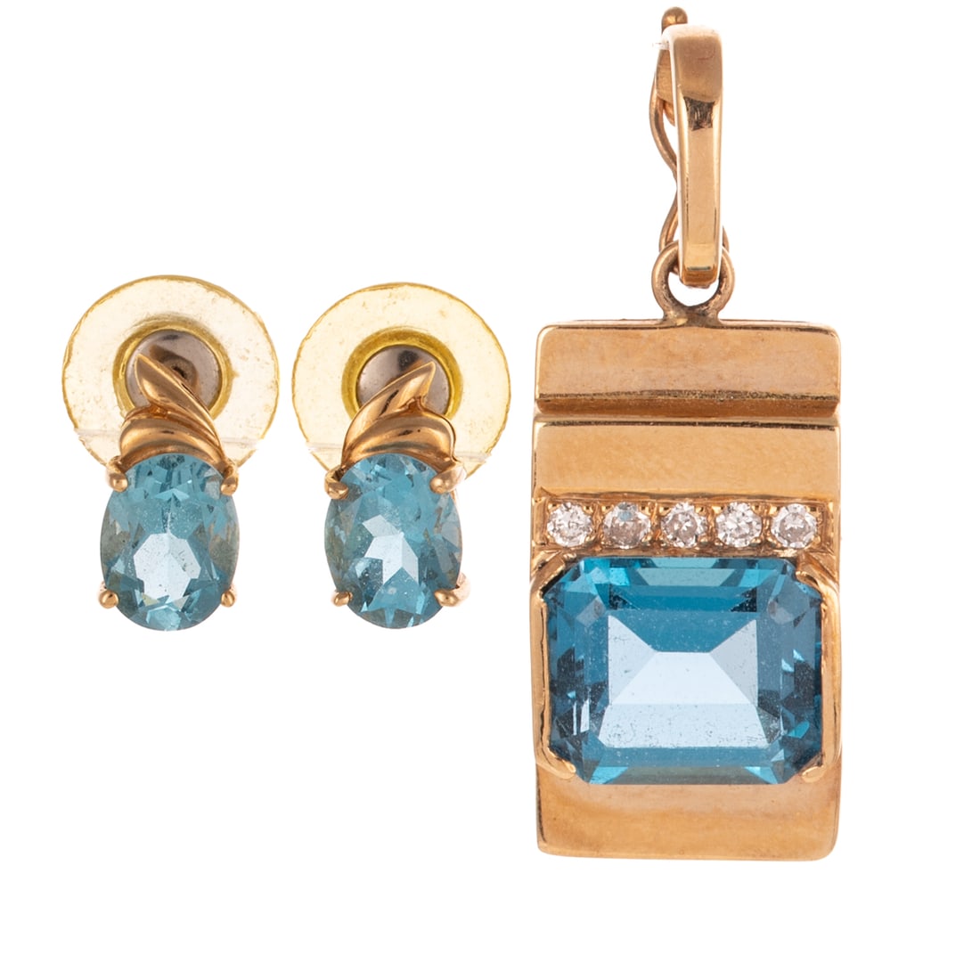 A Pair of Blue Topaz Earrings & Pendant in 14K: 1) 14K yellow gold earrings featuring oval shaped topaz measuring 8.9 x 7 mm prong set with high polish organic detail above, posts with friction backs, 1/2 in. L and 2) 14K yellow gold rectangular