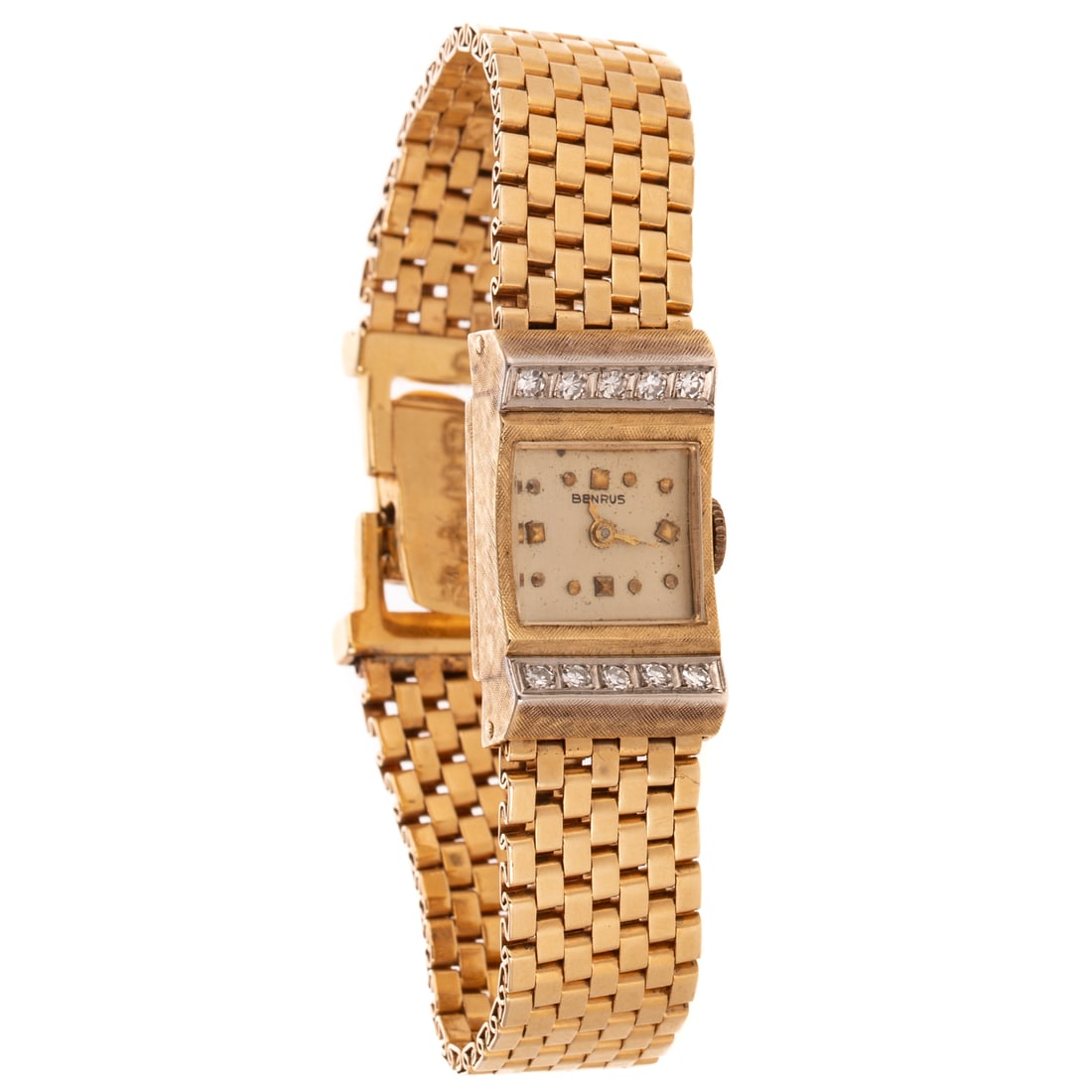 A Retro Benrus Diamond Watch in 14K: 14K yellow gold wrist watch by Benrus with square dial and diamonds bead set in a line at 12 and 6 o'clock, high polish panther link bracelet with fold over clasp with safety chain, mechanical movemen