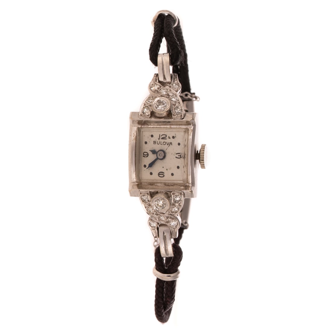 An Art Deco Bulova Diamond Dress Watch in 14K: 14K white gold dress watch by Bulova featuring a square dial with diamonds weighing approx. 0.25 ctw in twist design at top and bottom of dial, black cord strap with 1/20 10K gold filled fold over