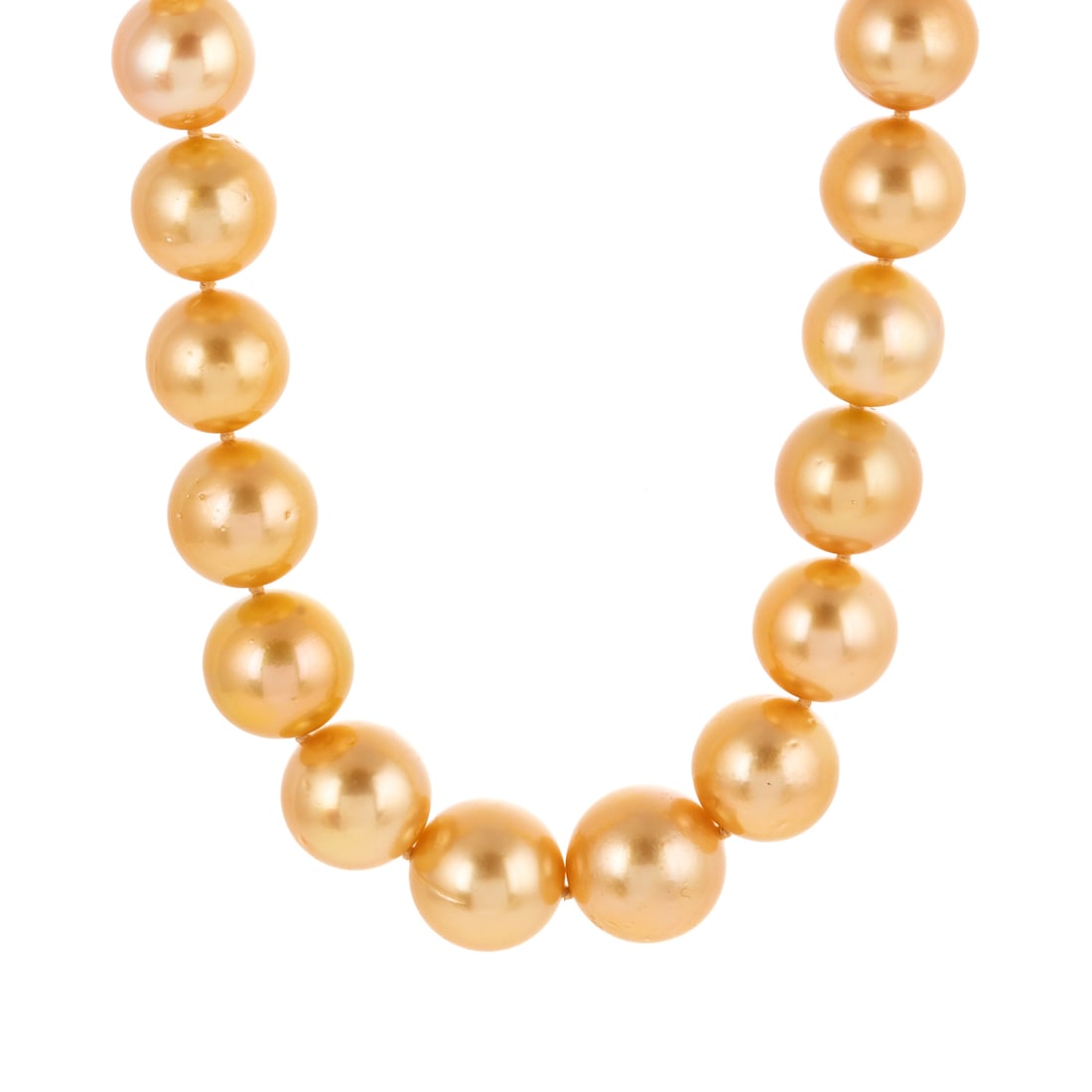 A Strand of Golden South Sea Pearls with 18K Clasp: Strand of slightly graduated well matched golden South Sea pearls with high lustre ranging in size from 14.6 - 12.2 mm, 18K yellow ball clasp with bead set diamonds, 18 in L., 100.3 grams