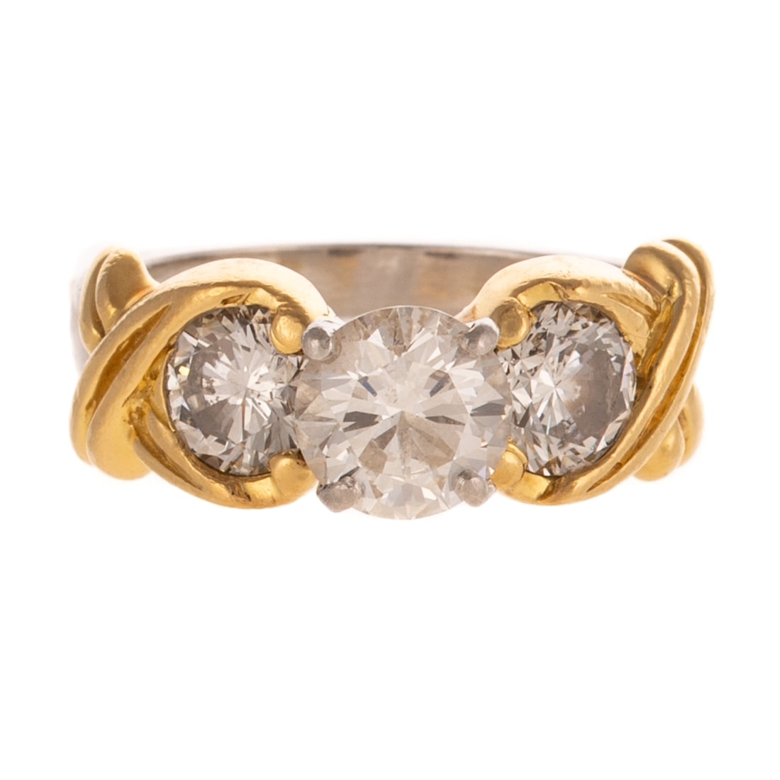A 2.25 ctw Diamond Ring in Platinum: Platinum ring featuring a round diamond weighing approx. 1.05 ctw with an average color grade of G - H and an average clarity grade of SI prong set between two round diamonds weighing approx. 1.20 ctw