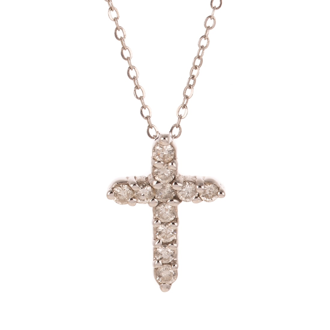 A Diamond Cross Pendant and Chain in 14K: 14K white gold pendant necklace featuring a cross with round diamonds weighing approx. 0.55 ctw with an average color grade of H - I and an average clarity grade of VS- SI, prong set, 3/4 in. L,