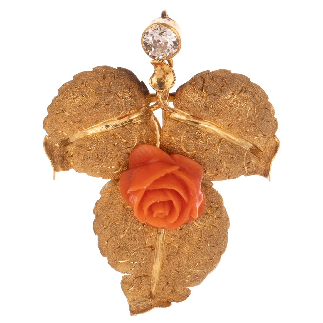 A Victorian Coral & Diamond Leaf Pendant in 14K: Antique 14K yellow gold brooch of leaf form with textured finish and high polish details, central carved coral rose, surmounted by an Old Mine diamond approx. 0.38 ct with an average color grade of I