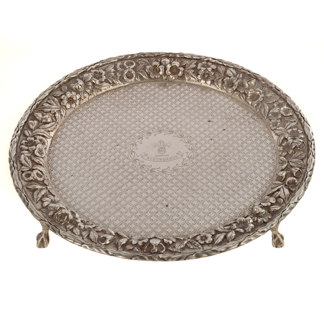 S Kirk & Son Sterling Armorial Salver: 1896-1924, model# 1709, circular, repousse floral border, against a stippled ground, applied foliate rim, the surface with bright-cut decoration, centered with a chased fleur-de-lis and banner inscrib